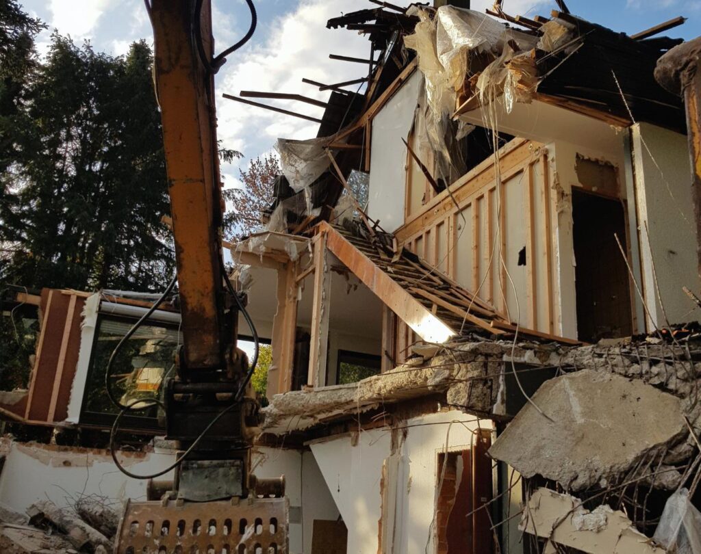 Home demolition in Fountain Hills, AZ with hillside terrain